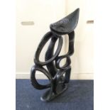 An African probably Zimbabwean carved stone sculpture of a semi abstract figure (a/f) height 78cm