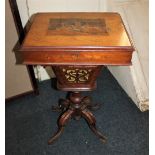 A Victorian inlaid sewing table with fitted interior and silks box on baluster support and four