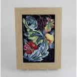 A framed Moorcroft pottery 'Study in Fruit' pattern plaque, number 11 of 50, 24cm by 16.5cm