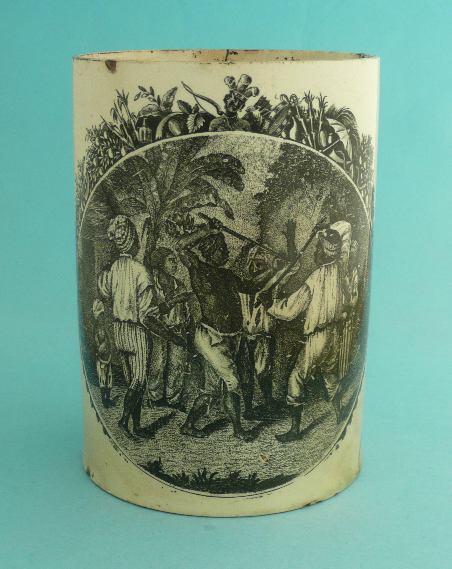 Anti-Slavery: a creamware cylindrical tankard printed in black with a scene of a cudgelling