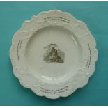 (Commemorative anti-slavery slave) A porcelain plate of scrolling outline printed en-grisaille