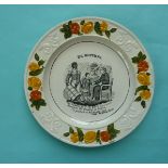 (Commemorative anti-slavery slave) A pearlware nursery plate the floral moulded border painted in