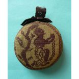 (Commemorative anti-slavery slave sampler) A very rare pincushion of circular form embroidered in