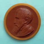 (Potlid pot lid Prattware) A circular terracotta plaque moulded with a head and shoulders profile