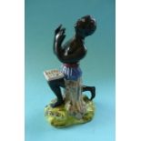 (Commemorative anti-slavery slave) A Staffordshire pottery figure modelled as a kneeling figure,