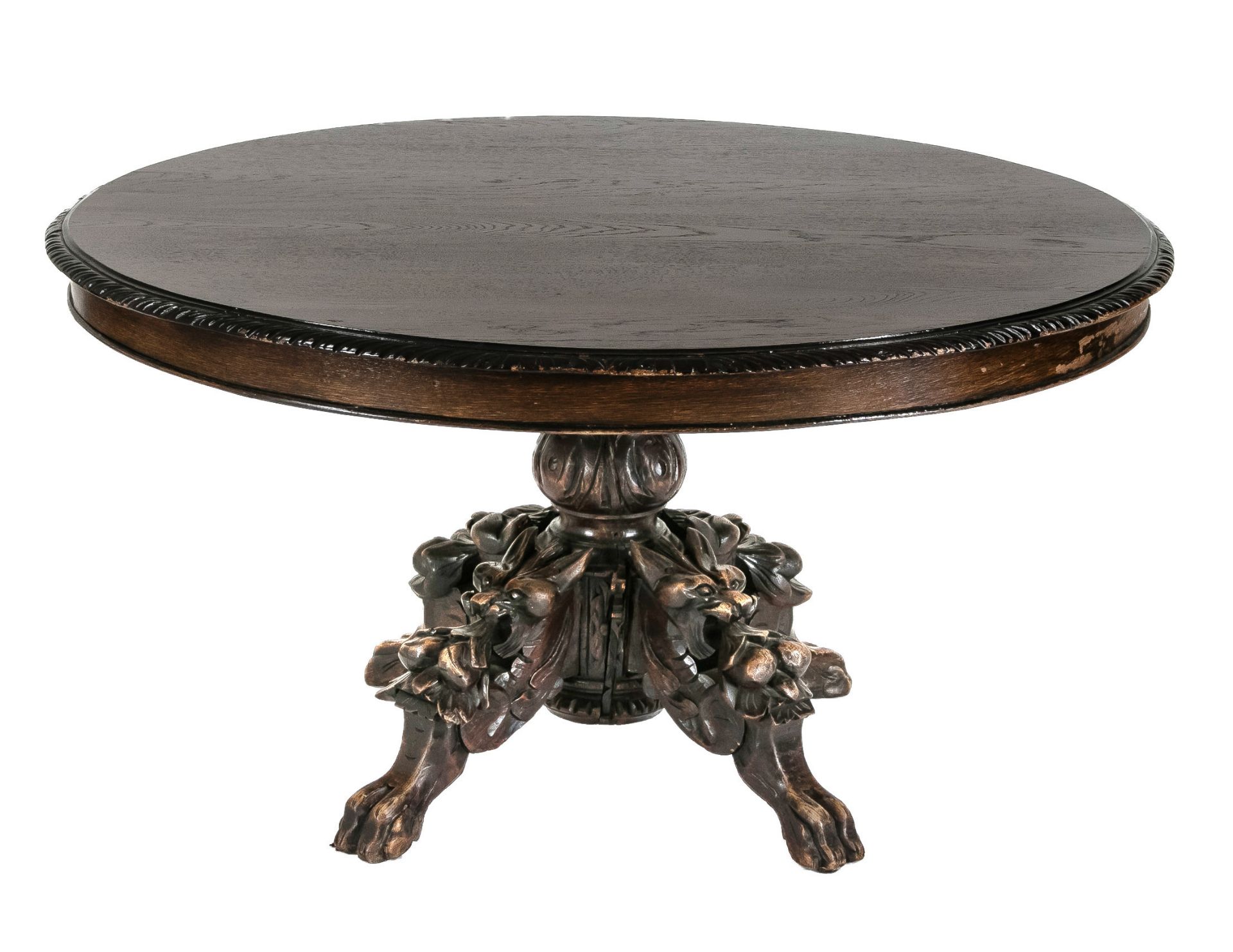Oval salon table around 1870. solid oak, three richly carved feet in the shape of foxes, 60 x 114