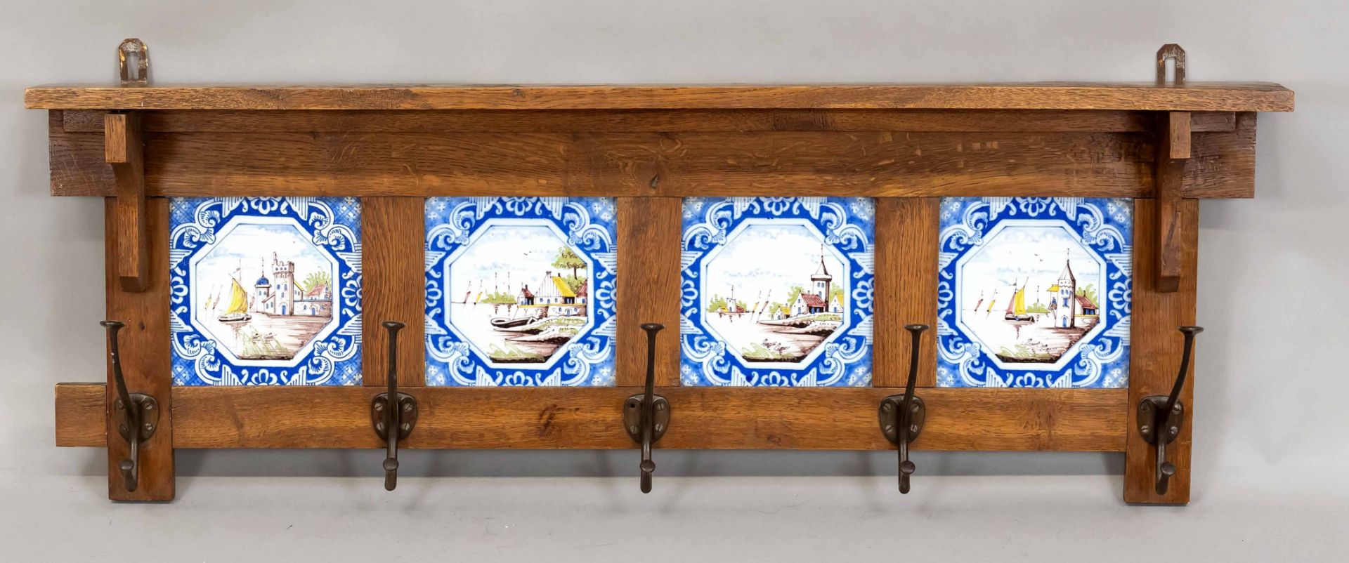 Wall coat rack, end of 19th c., 4 tiles with landscapes in oak frame, 5 double hooks, 33 x 92 cm