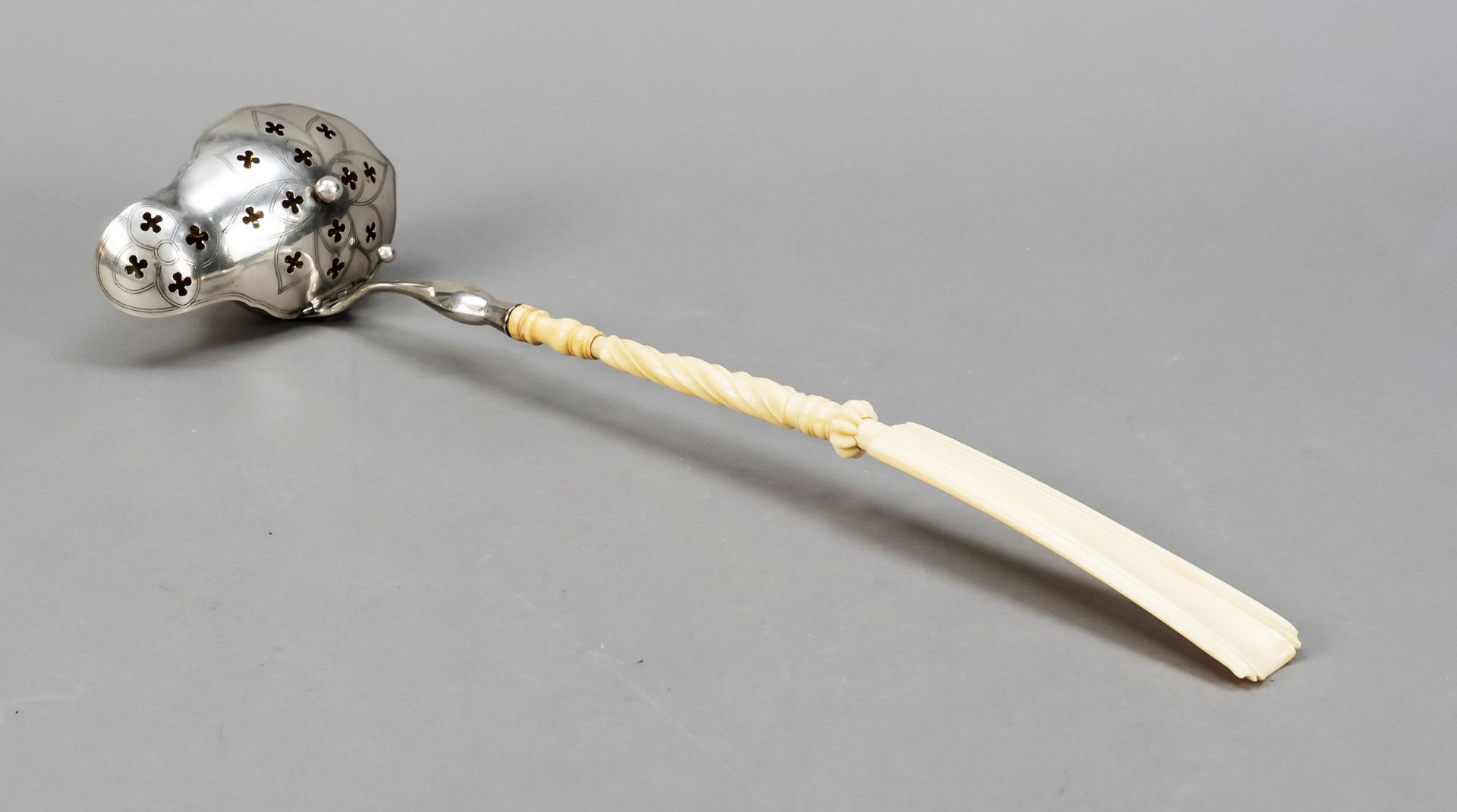 Punch ladle, c. 1900, silver tested, gilt interior, of curved form, ladle with hinged lid, open-