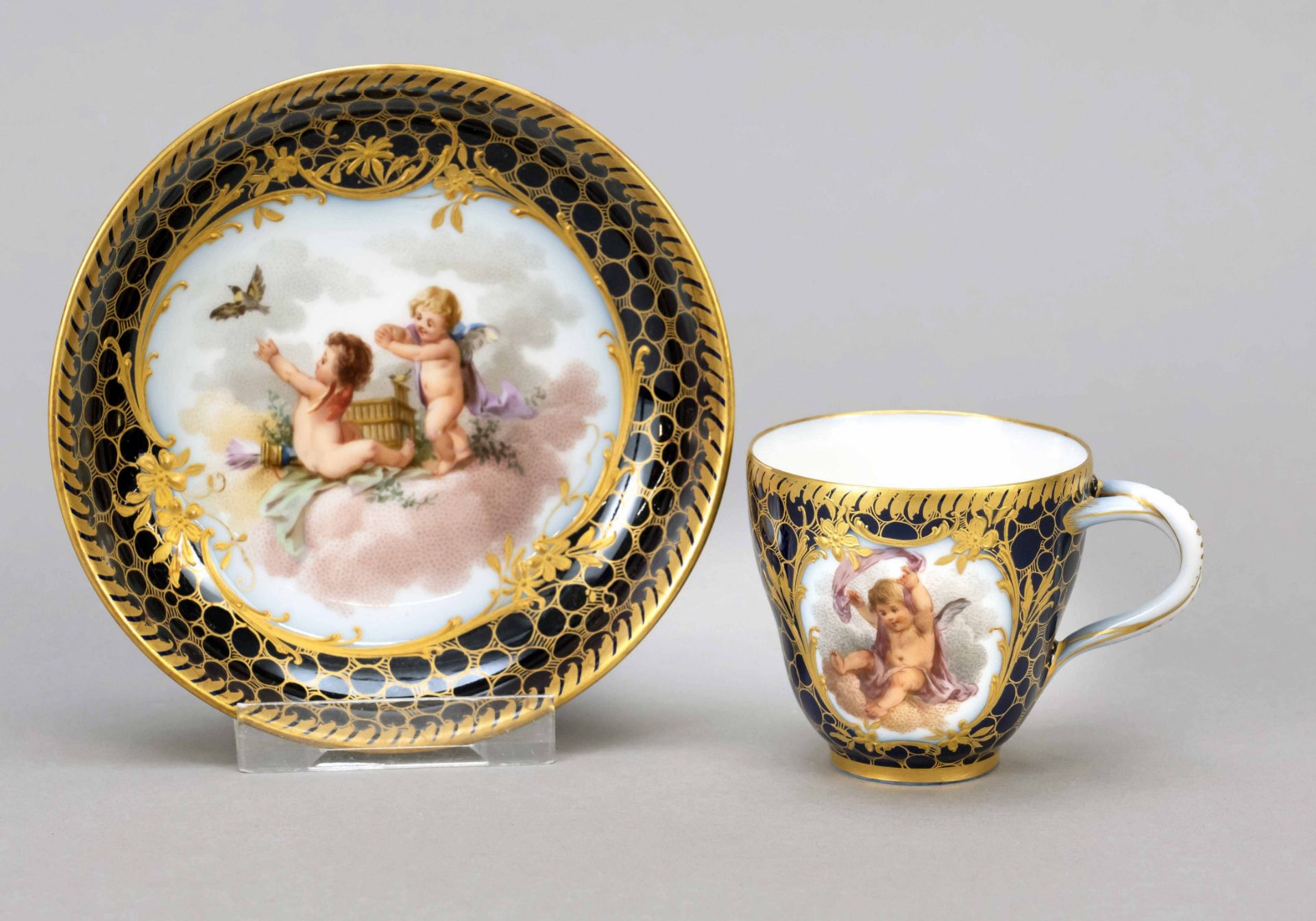Demitasse with saucer, KPM Berlin, 19th c., 1st w., painter's mark, two-piece ear handle, polychrome