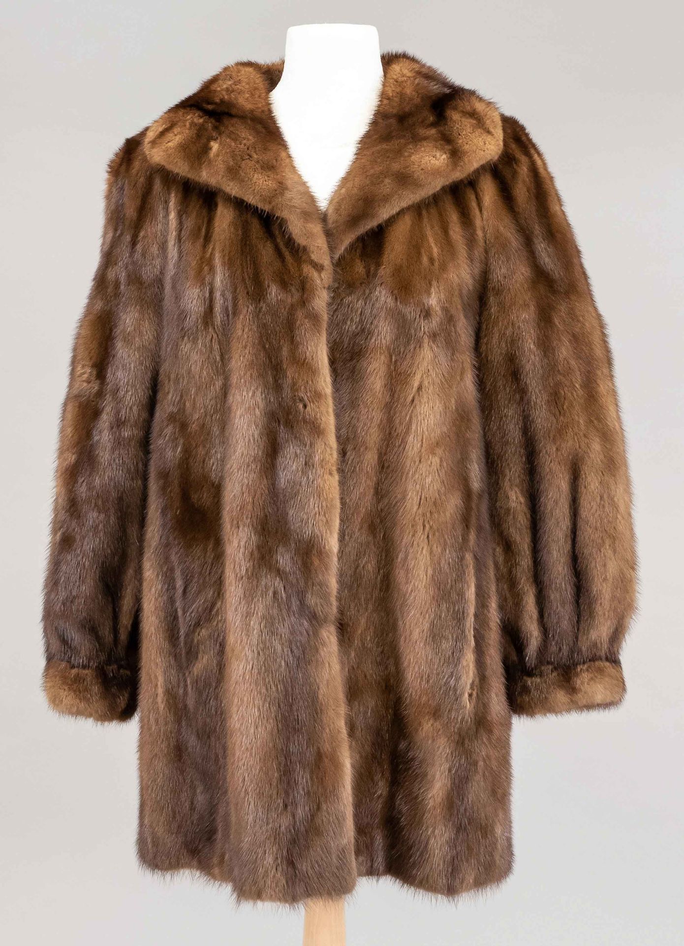 Women's mink jacket, marked Your Sixth Scythe/Saga Mink on a label in the lining. Without size
