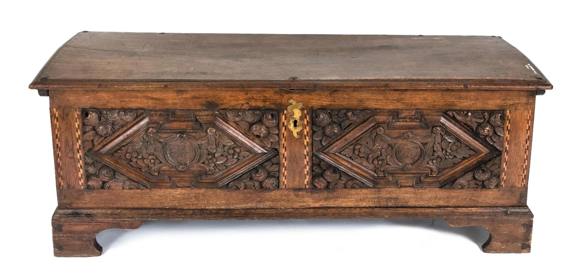 Baroque lidded chest, 18th c. Solid oak, rectangular body inlaid on the outside and lavishly carved,