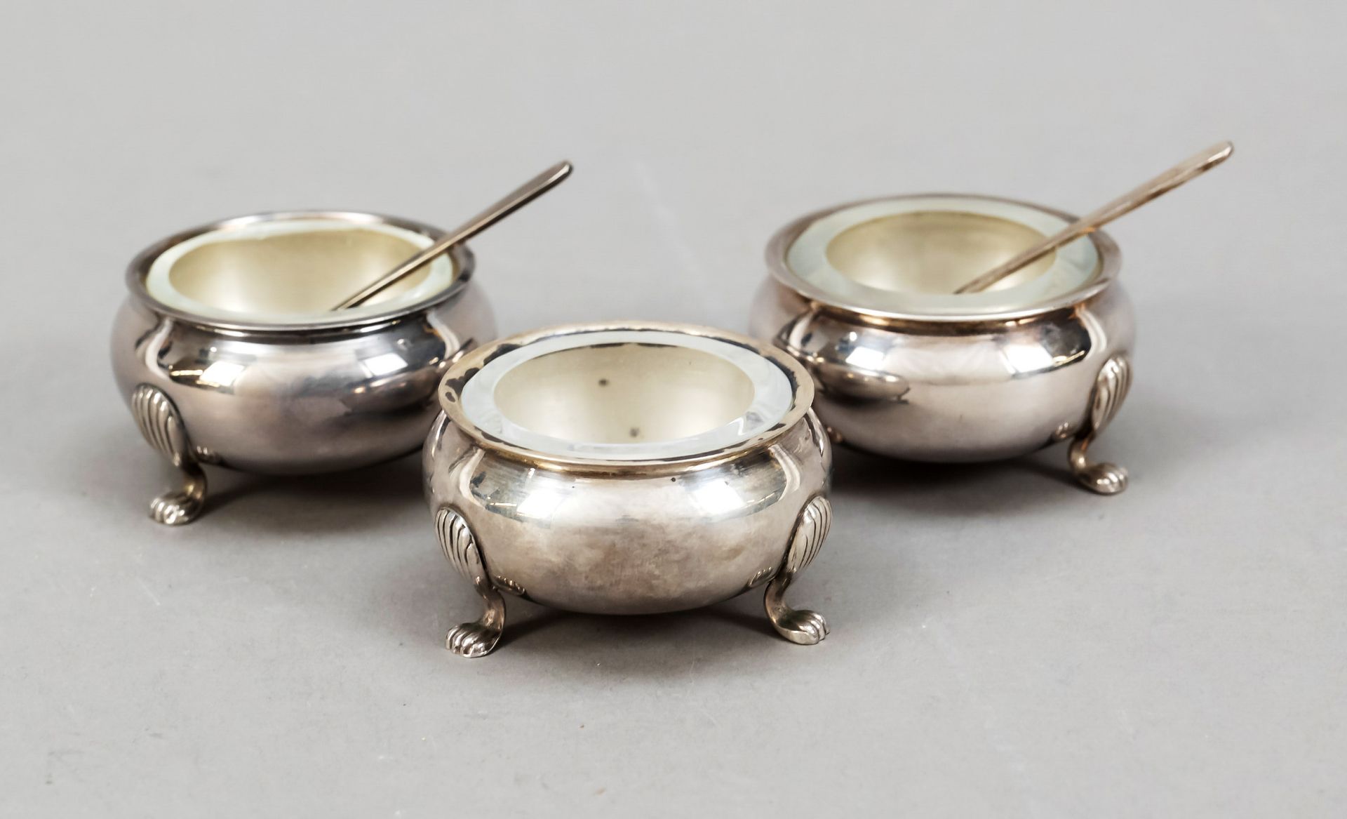 Three salvers with 2 spoons, 20th century, silver 950/000, on 3 feet, smooth bulbous body,