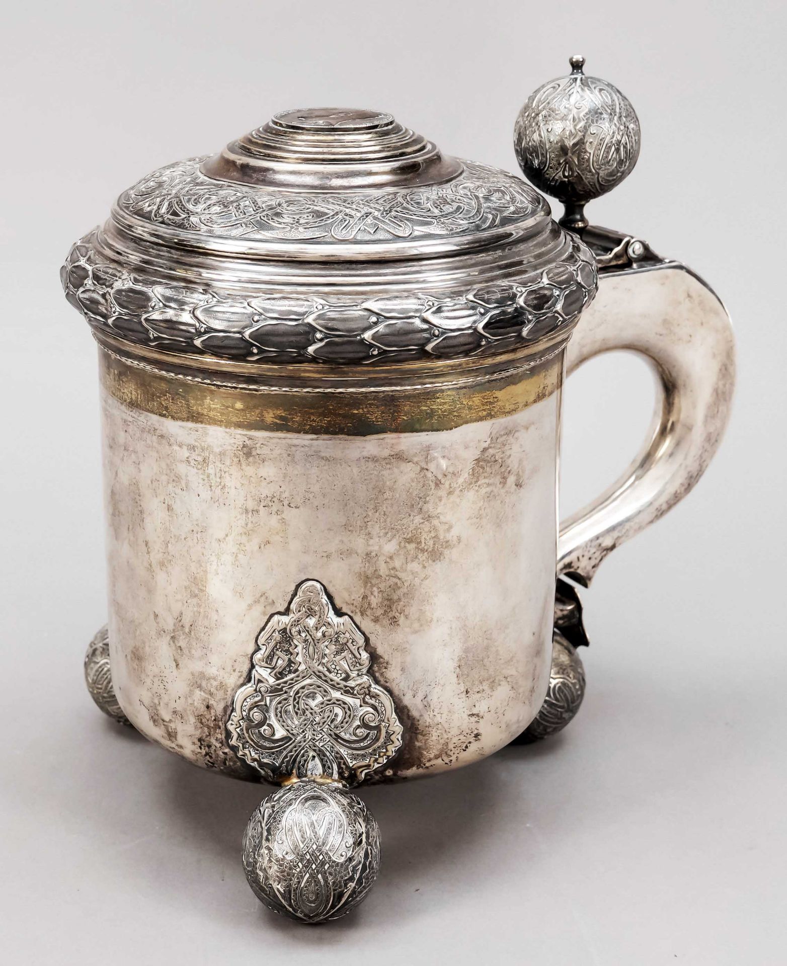 Large tankard, Sweden, 1945, maker's mark CGH, silver 830/000, gilt interior, on 3 decorated ball