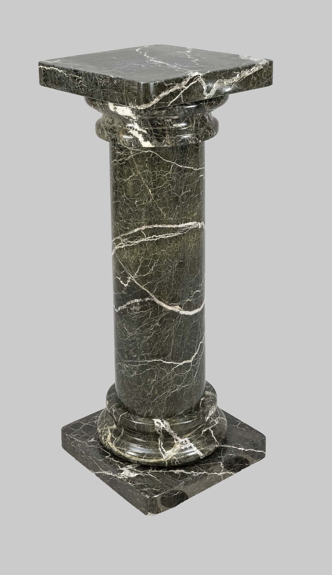 Heavy floral column/palm pedestal, 20th c., polished black-green white veined marble. Simple form,