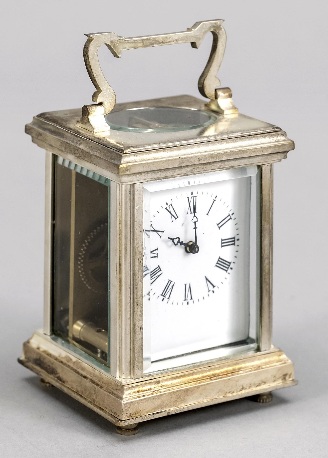 Travelling clock, 1st half of 20th century, silver plated, top handle, white enamel dial with