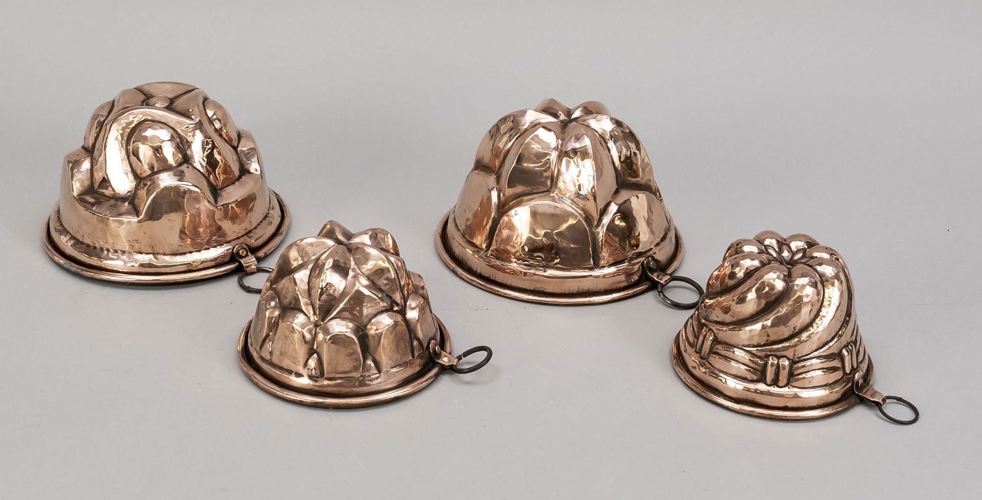4 Gugelhupf baking dishes, 19th c., copper with residual tinning, d. to 16 cm