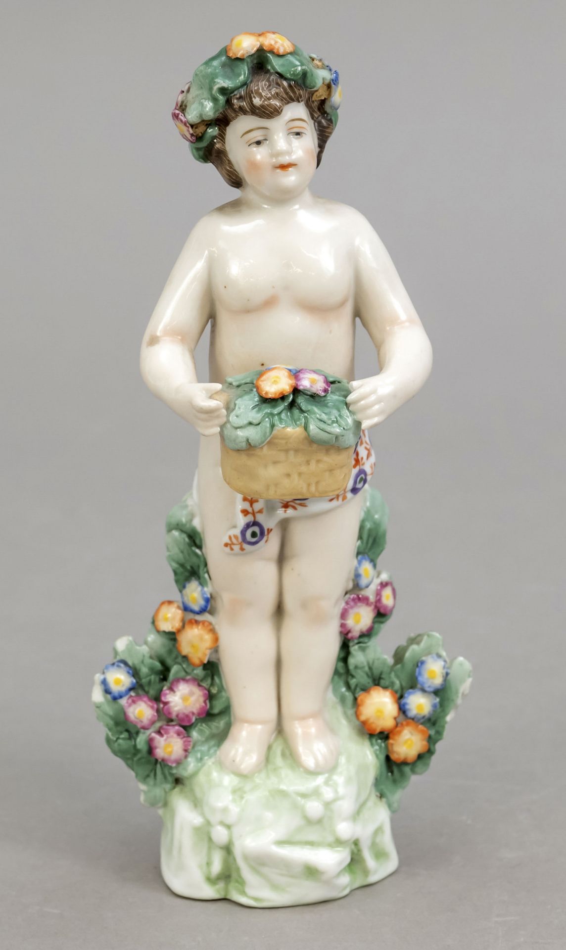 Putto with flower basket, Bock- Wallendorf, 20th century, on rock base standing boy with flower