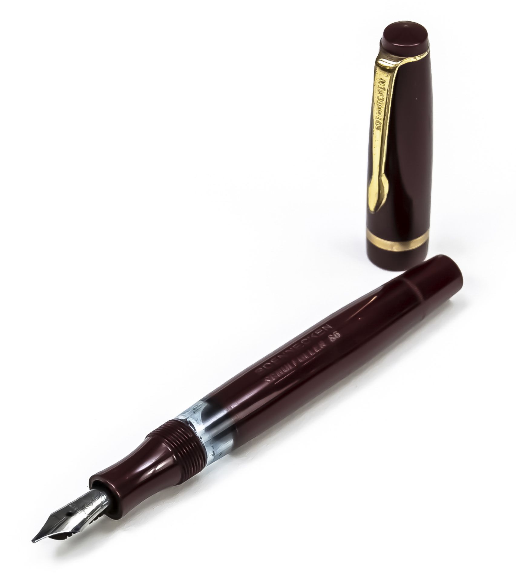 Soennecken piston fountain pen, 2nd half of 20th century, steel nib, burgundy case, gilded