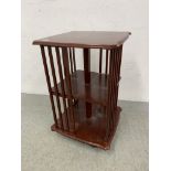 A REPRODUCTION MAHOGANY FINISH REVOLVING BOOKCASE - W 45CM. D 45CM. H 71CM.