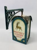 A VINTAGE WATNEY COMBE REID ADVERTISING BRACKET LANTERN, WITH COPPER TOP.