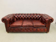 AN OXBLOOD LEATHER CHESTERFIELD STYLE 3 SEATER SOFA, L 205CM.