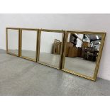 FOUR MATCHING GILT FRAMED WALL MIRRORS EACH W 46CM. H 57CM.