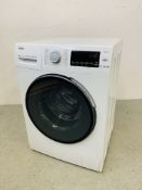 A HAIER DIRECT MOTION WASHING MACHINE MODEL HW80-B1439 - SOLD AS SEEN