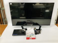 AN LG 42 INCH TELEVISION 3D SMART TV WITH REMOTE AND INSTRUCTIONS AND LG 3D BLU RAY DVD PLAYER WITH