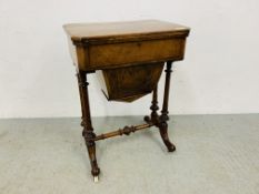 A VICTORIAN WALNUT VENEERED WORK TABLE WITH DRAWER ABOVE SLIDING BASKET AND TWO SECTION FOLDING TOP