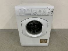 A HOTPOINT AQUARIUS WASHING MACHINE - SOLD AS SEEN.