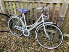 A LADIES RALEIGH CAPRICE THREE SPEED BICYCLE.