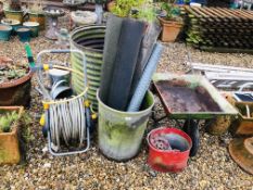 A LARGE GALVANISED TANK, GALVANISED BIN, GALVANISED WHEEL BARROW, 2 WATERING CANS,