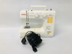 A JANOME MODEL 2050 ELECTRIC SEWING MACHINE WITH FOOT PEDAL - SOLD AS SEEN