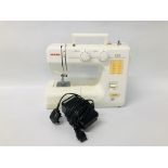 A JANOME MODEL 2050 ELECTRIC SEWING MACHINE WITH FOOT PEDAL - SOLD AS SEEN