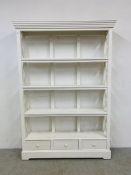 A WHITE PAINTED FOUR TIER BOOKSHELF WITH DRAWERS TO BASE - HEIGHT 200CM. WIDTH 132CM. DEPTH 30CM.