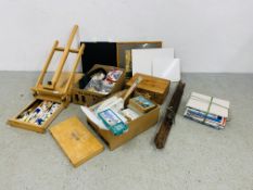 A COLLECTION OF ARTISTS EQUIPMENT TO INCLUDE SKETCH PADS, PENCILS, BOOKS, EASELS, CASES ETC.