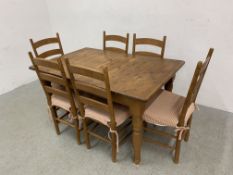 A COUNTRY WAXED PINE EXTENDING KITCHEN TABLE - L 140CM.