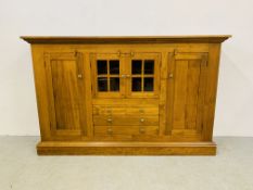 A LARGE WAXED FINISH COMBINATION DRESSER,