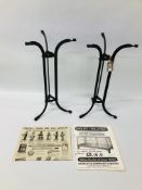 PAIR OF 1920'S IRON DISPLAY TABLE STANDS - H 48CM ALONG WITH 1920'S ADVERTISEMENTS.