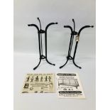 PAIR OF 1920'S IRON DISPLAY TABLE STANDS - H 48CM ALONG WITH 1920'S ADVERTISEMENTS.