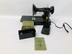 A VINTAGE SINGER PORTABLE ELECTRIC SEWING MACHINE NO.