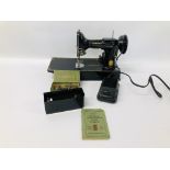 A VINTAGE SINGER PORTABLE ELECTRIC SEWING MACHINE NO.