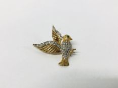 A 9CT GOLD DIAMOND AND EMERALD SET HUMMING BIRD BROOCH