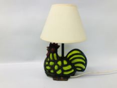 METAL CRAFT LAMP IN THE FORM OF A CHICKEN WITH BLOWN GREEN GLASS BODY - SOLD AS SEEN.