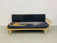 AN ERCOL BLONDE DAY BED A/F CONDITION, FOR RESTORATION.