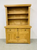 A SOLID LIGHT OAK MODERN DRESSER,