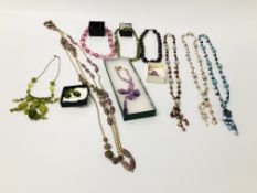 TRAY OF ASSORTED BEADED NECKLACES TO INCLUDE ONE GREEN, ONE PURPLE EARRING AND NECKLACE SETS.