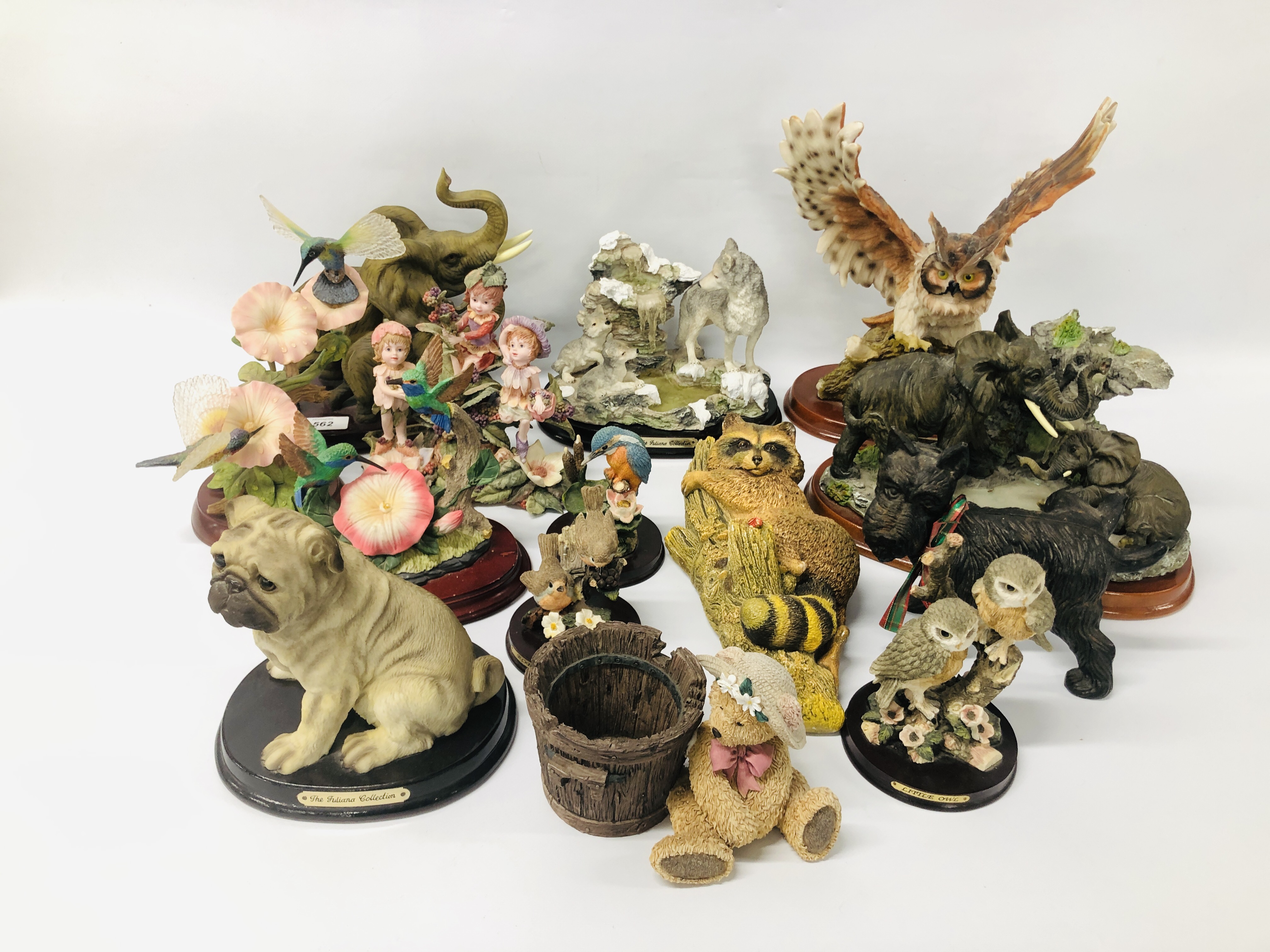 COLLECTION OF 13 ANIMAL COLLECTOR FIGURES TO INCLUDE ELEPHANTS, DOGS, BIRDS,