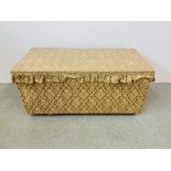 AN ANTIQUE PINE UPHOLSTERED OTTOMAN W 120CM. D 52CM. H 58CM.