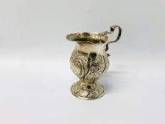 SILVER CREAM JUG OF TULIP FORM DECORATED WITH ROSES,